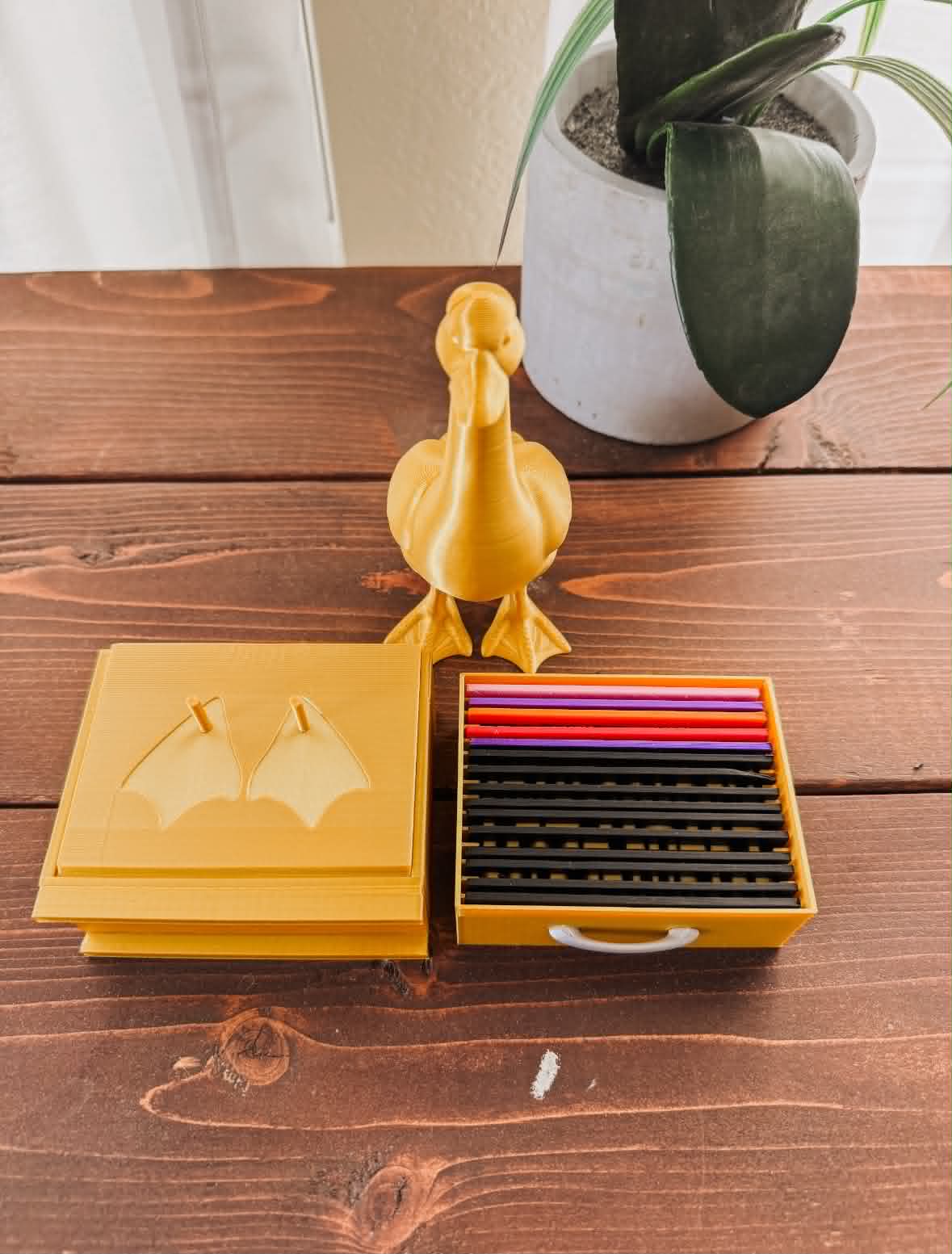 Golden Goose desk buddy trophy with hidden drawer for sign storage and a platform